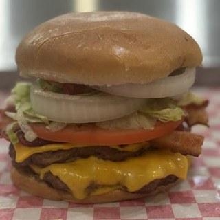 Central Park cheeseburger hot off the grill